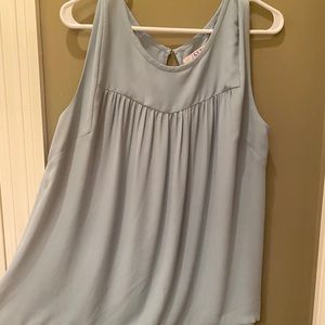 Light blue shirt tail hem blouse with keyhole back